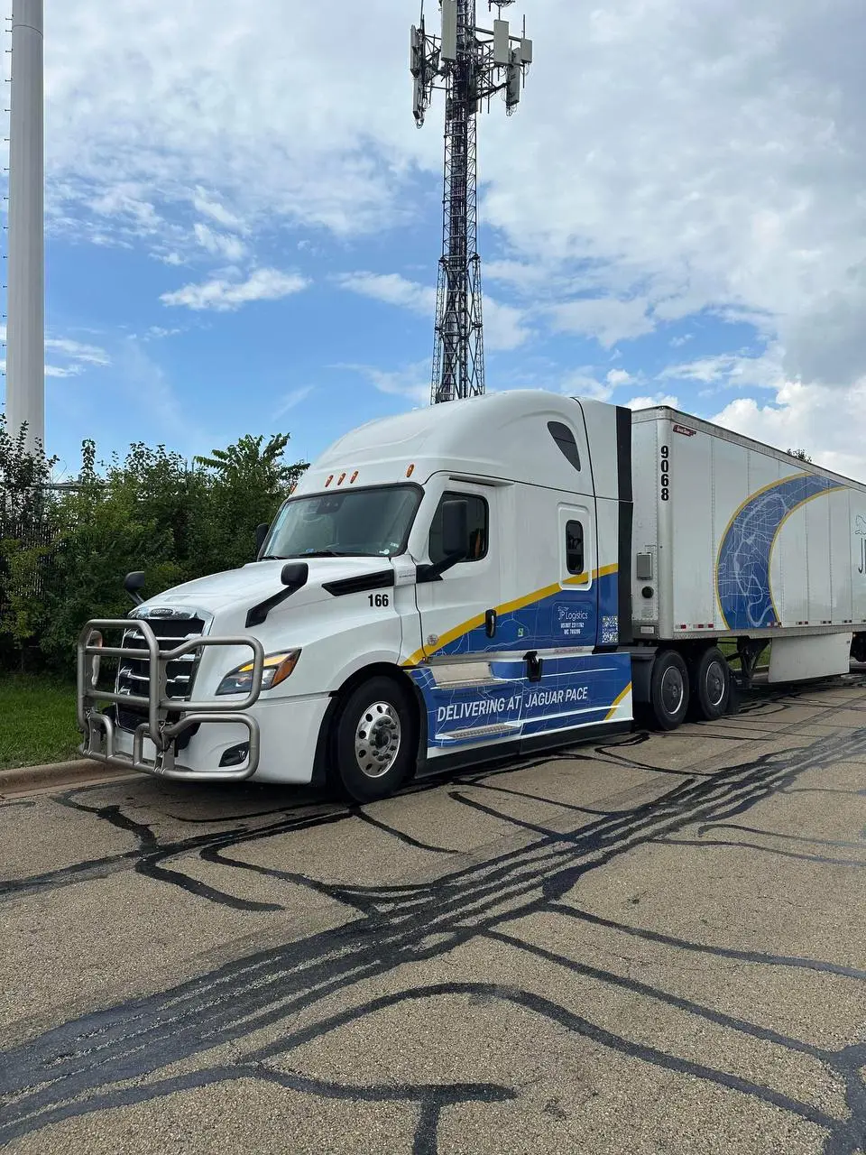 JP Logistics semi-truck with company branding